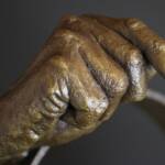 Bronze baton hand - close side view